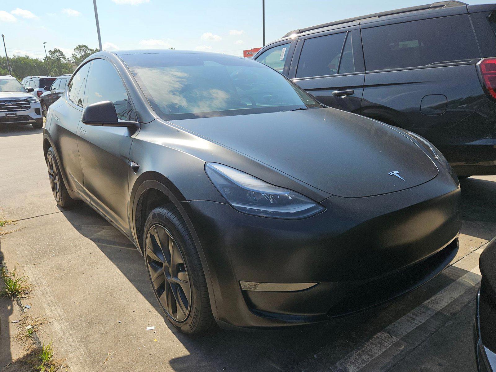 Used 2024 Tesla Model Y Long Range with VIN 7SAYGDED3RA308747 for sale in Des Plaines, IL